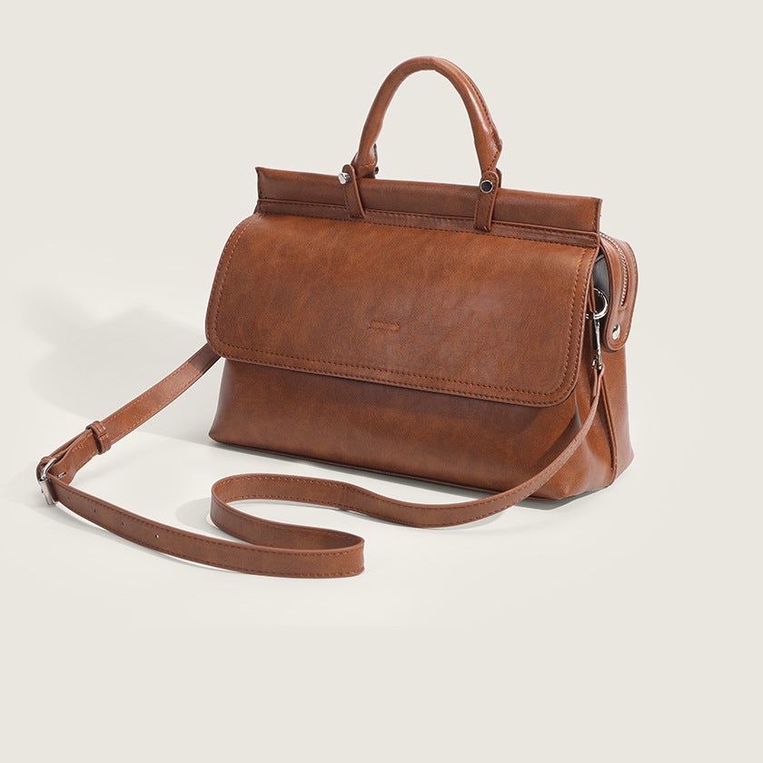 Veelzijdige draagtas met textuur, die als schoudertas kan worden gedragen