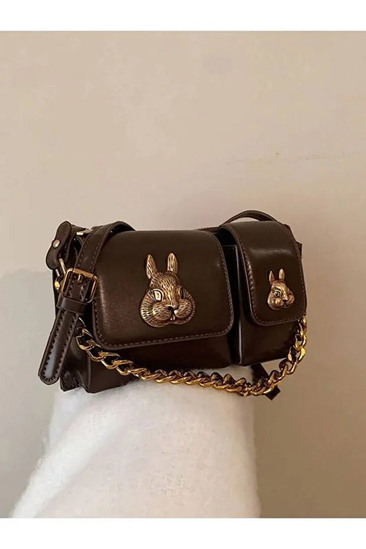 Dames bruine stokbroodtas met eekhoorn accessoireontwerp Stijlvolle schouderhandtas