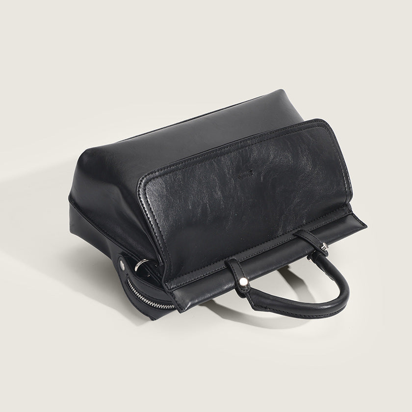 Veelzijdige draagtas met textuur, die als schoudertas kan worden gedragen